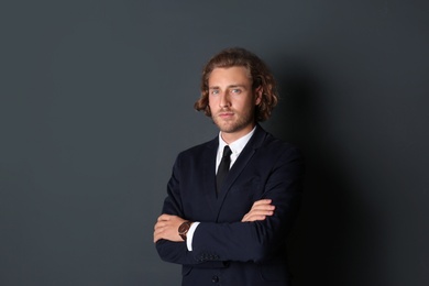 Photo of Portrait of handsome man on dark background