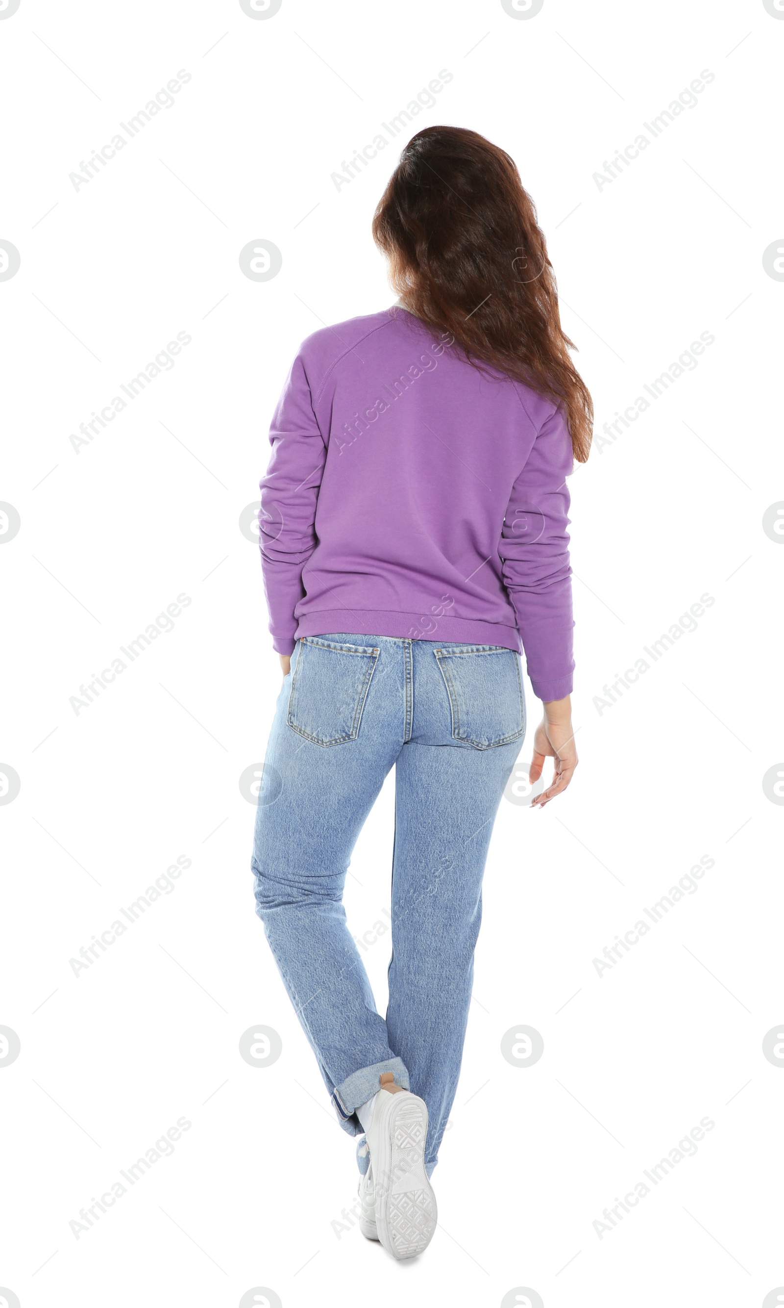 Photo of Beautiful young woman in stylish clothes on white background