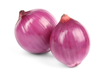 Photo of Fresh whole red onions on white background