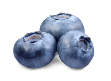 Photo of Three fresh ripe blueberries isolated on white