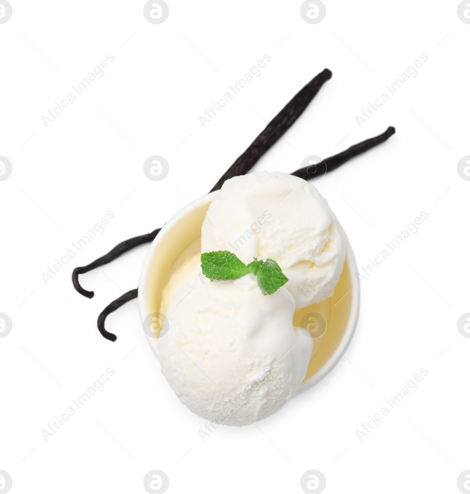 Photo of Delicious ice cream with mint and vanilla pods isolated on white, top view