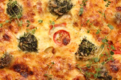 Photo of Delicious homemade vegetable quiche as background, closeup