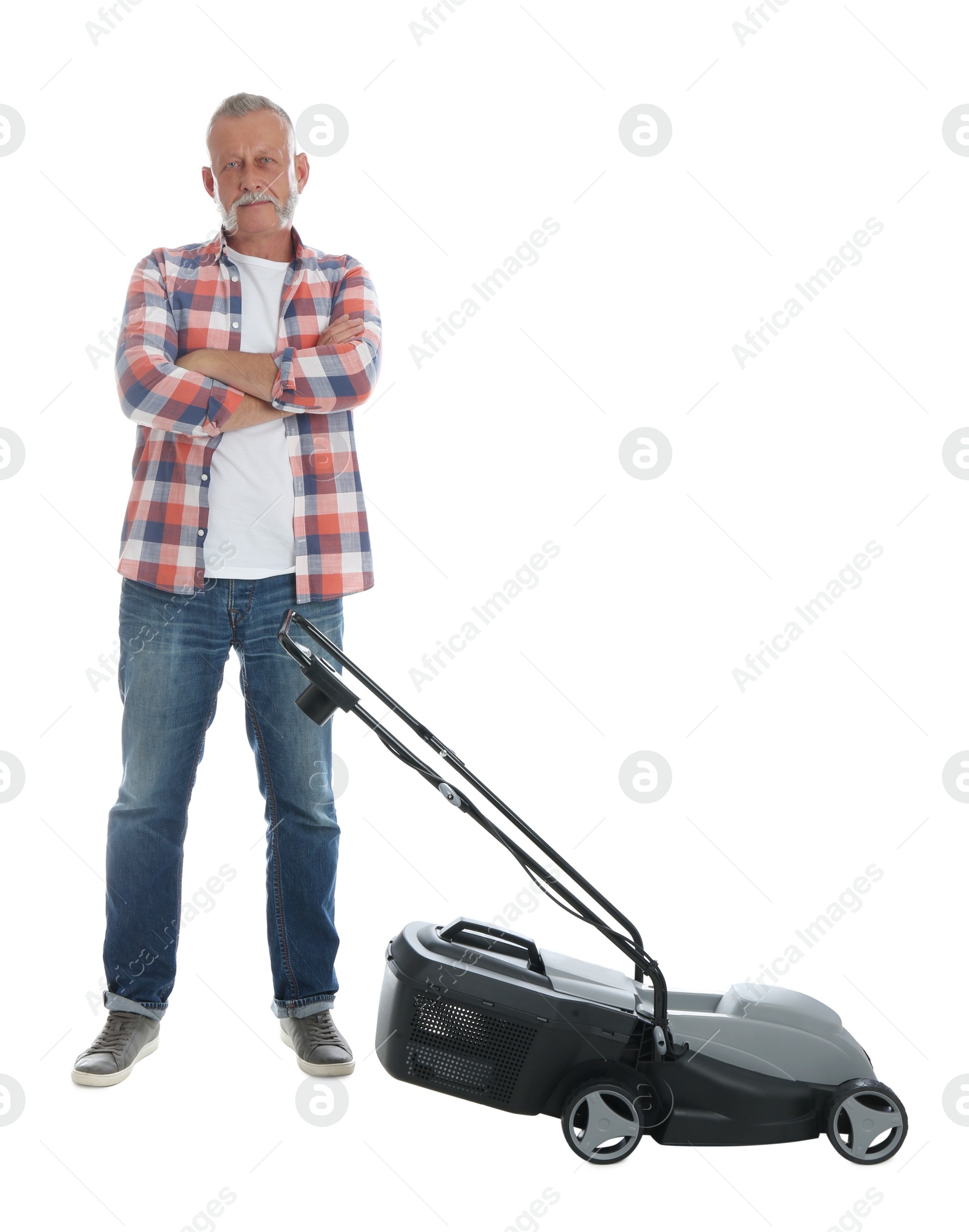 Photo of Senior man with modern lawn mower on white background