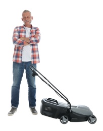 Senior man with modern lawn mower on white background