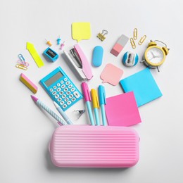 Image of Flat lay composition with school stationery on white background