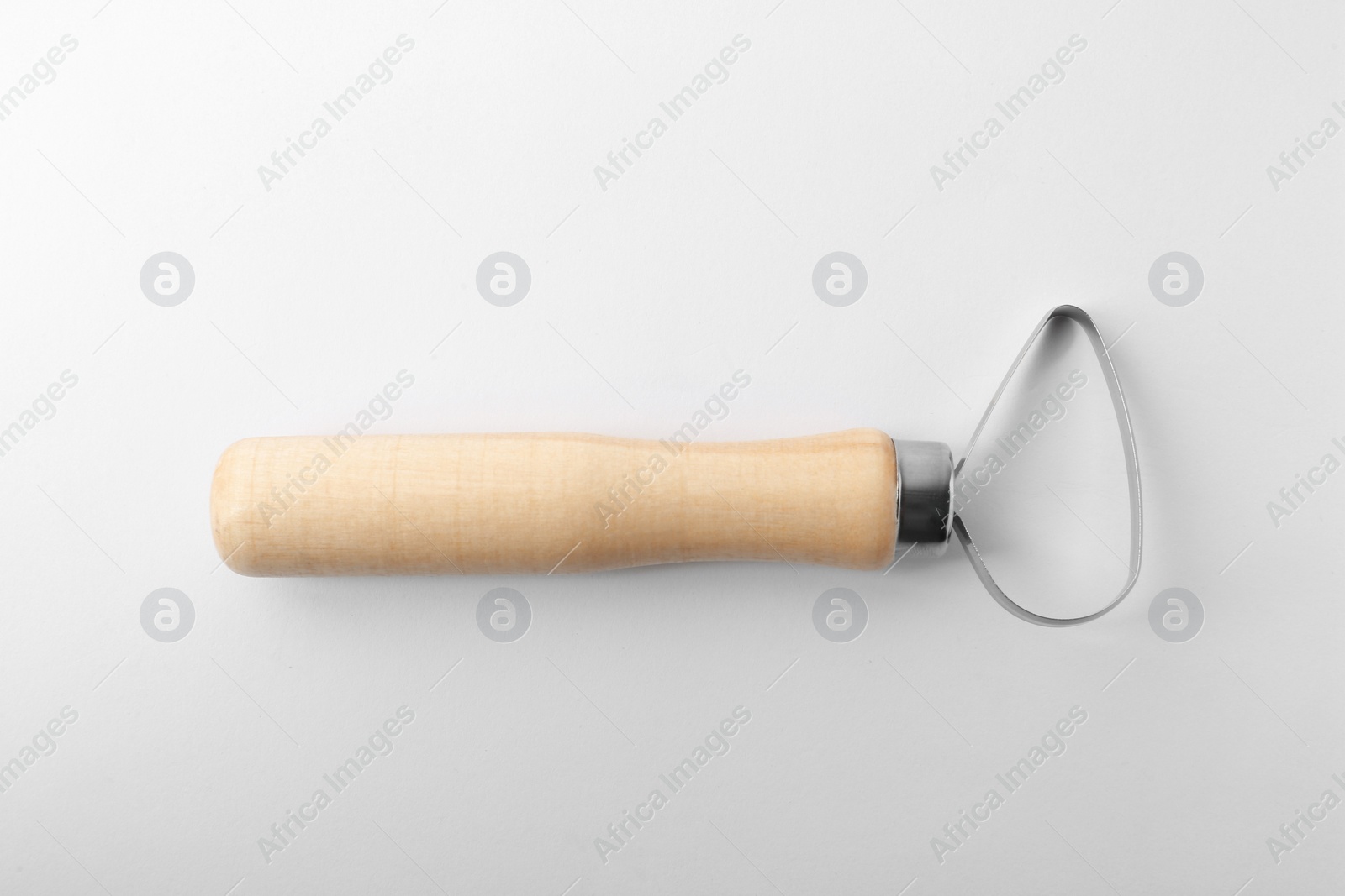 Photo of Loop tool with wooden handle for clay modeling on white background, top view