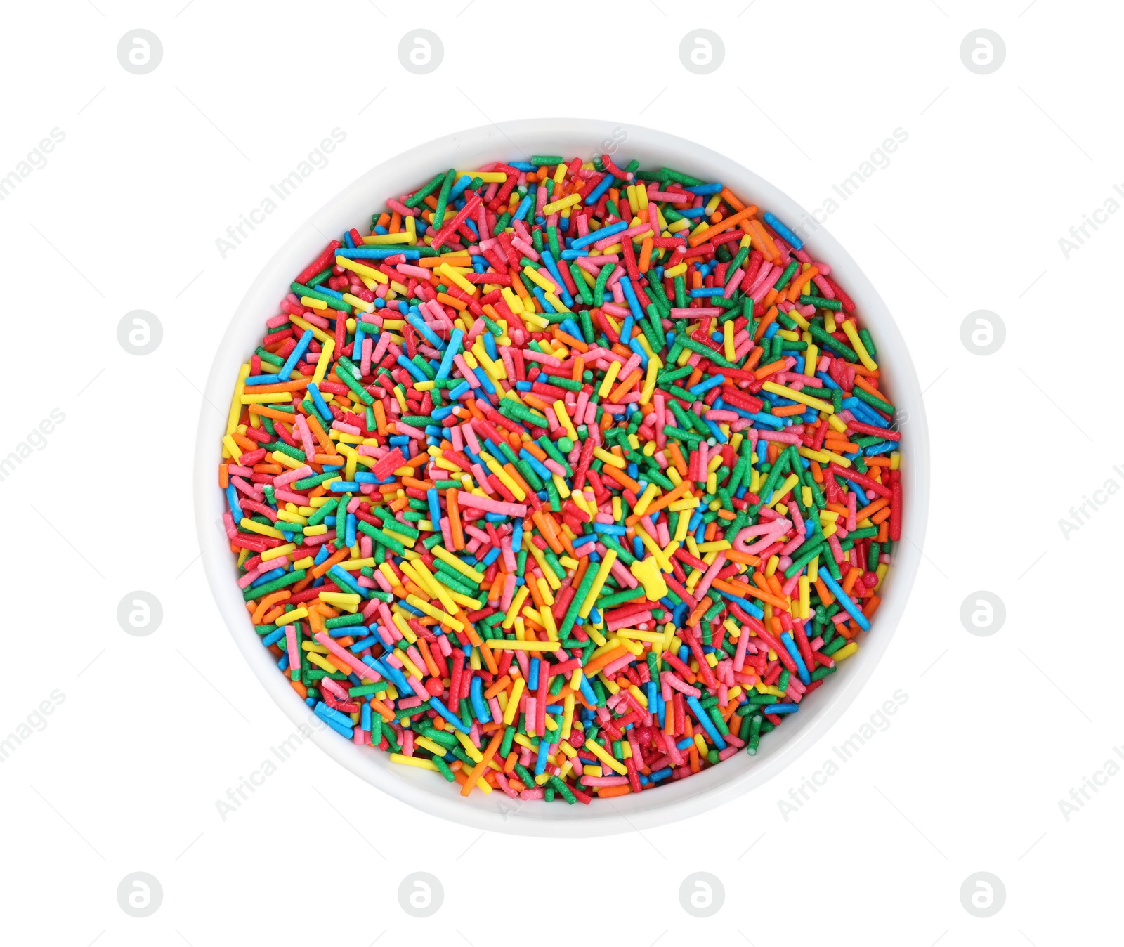 Photo of Colorful sprinkles in bowl on white background, top view. Confectionery decor