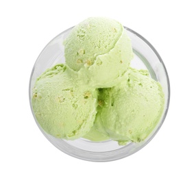 Dishware of sweet pistachio ice cream on white background, top view