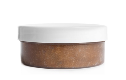 Container with natural scrub on white background