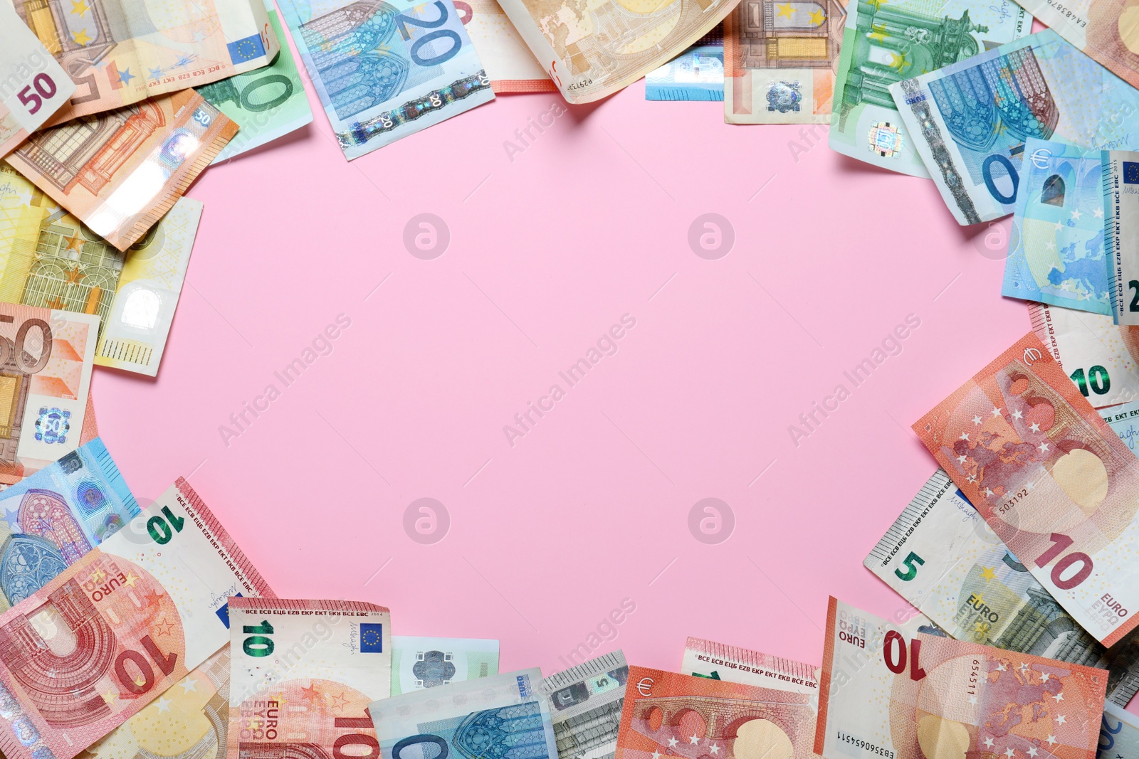 Image of Frame of money on pink background, flat lay. Space for text