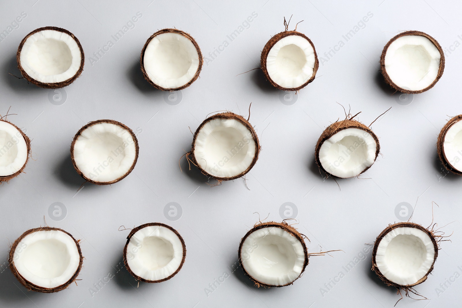 Photo of Coconut pattern on white background, top view