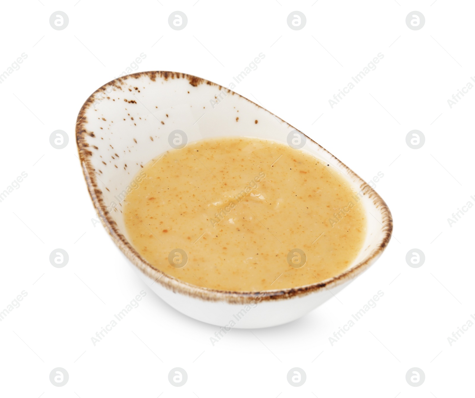 Photo of Delicious turkey gravy in sauce boat isolated on white