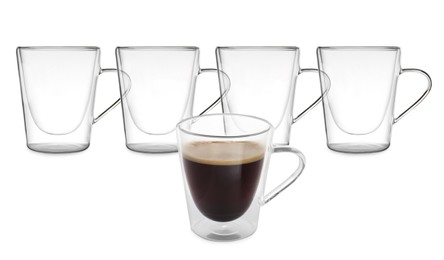 Empty glass cups and one with aromatic coffee on white background. Banner design