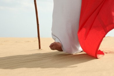 Photo of Jesus Christ walking in desert, closeup view
