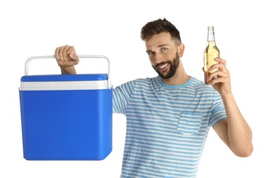 Photo of Happy man with cool box and bottle of beer on white background