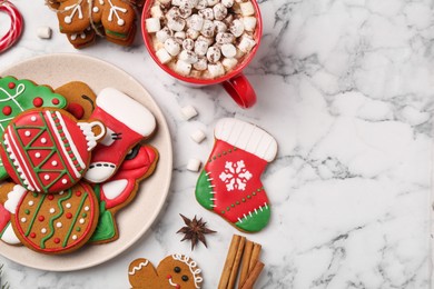 Photo of Flat lay composition with decorated Christmas cookies on white marble table. Space for text