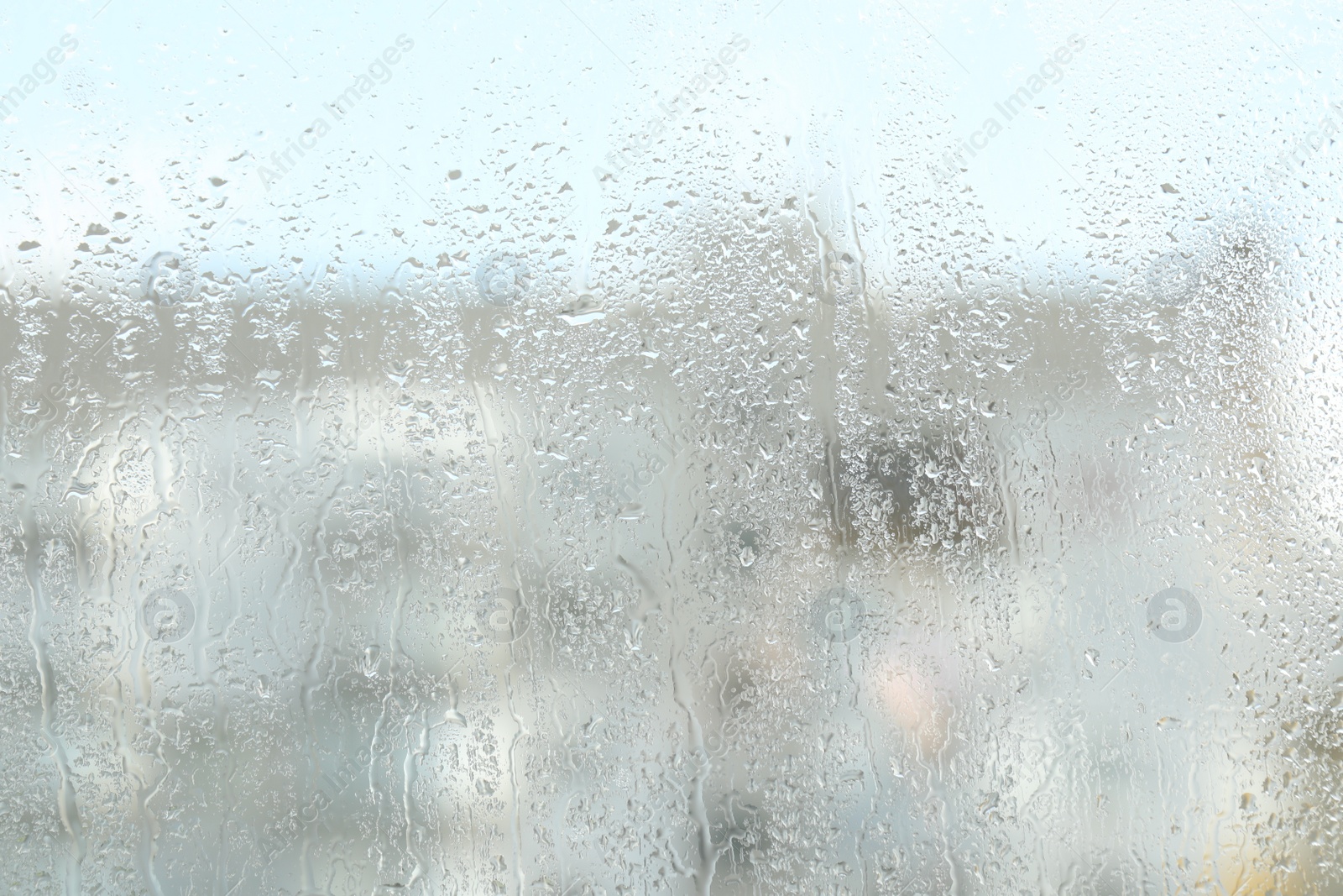 Photo of Window glass with raindrops as background, closeup