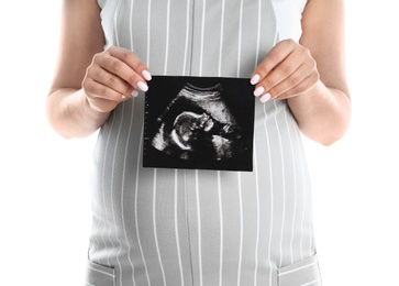 Photo of Pregnant woman with ultrasound picture on white background, closeup