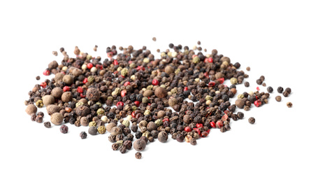 Photo of Mix of different pepper grains isolated on white