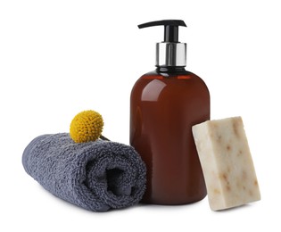 Soap bar, dispenser and terry towel on white background