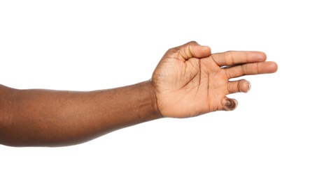 African-American man showing hand gesture on white background, closeup