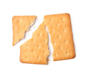 Photo of Crispy broken cracker isolated on white, top view