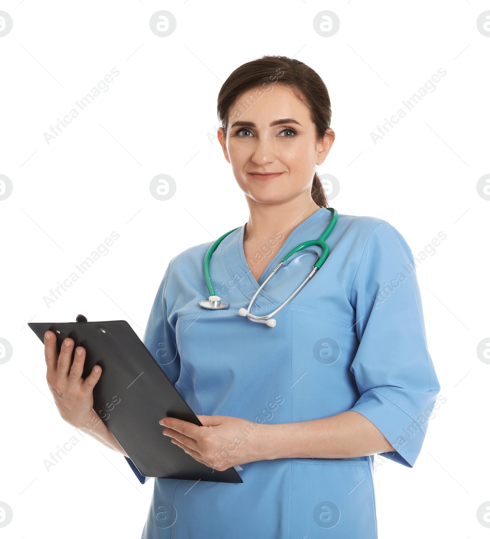 Photo of Portrait of female doctor in scrubs with clipboard isolated on white. Medical staff