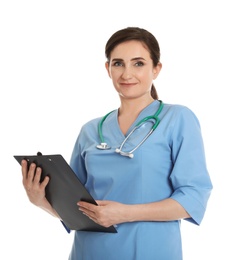 Photo of Portrait of female doctor in scrubs with clipboard isolated on white. Medical staff