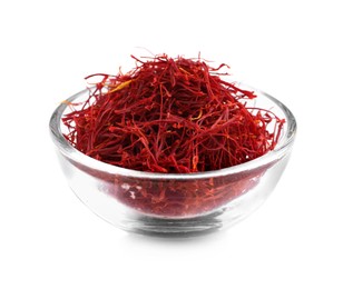 Photo of Aromatic saffron in glass bowl isolated on white