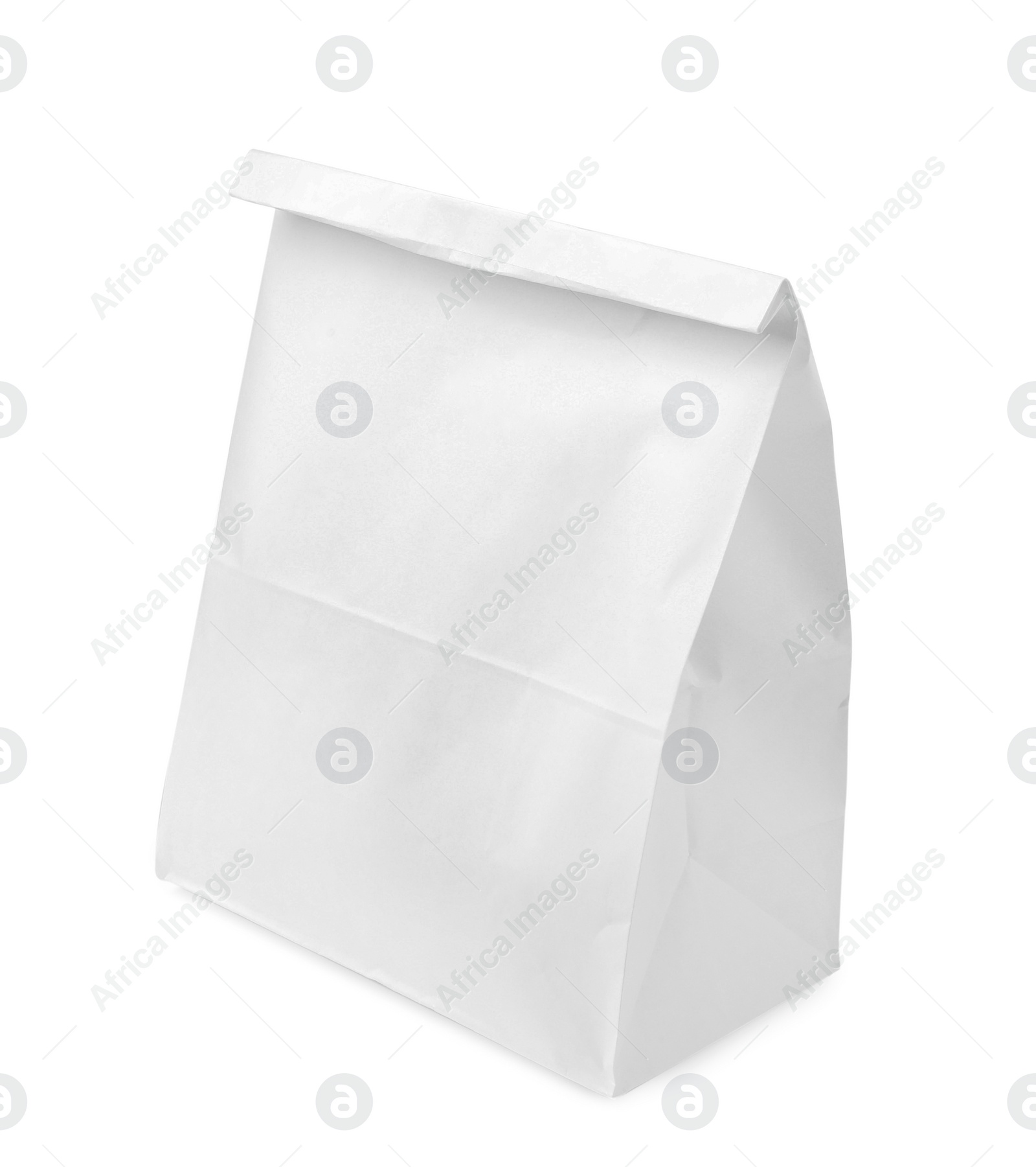 Photo of Closed paper grocery bag isolated on white