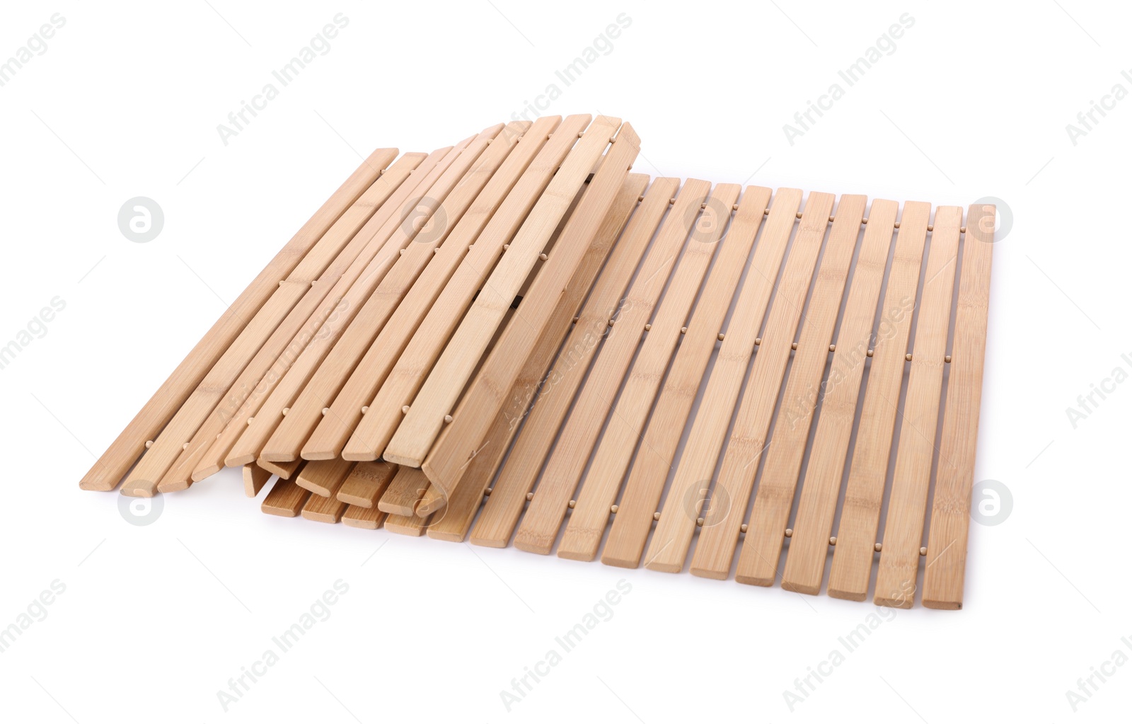 Photo of Modern bamboo rug isolated on white. Bath accessory