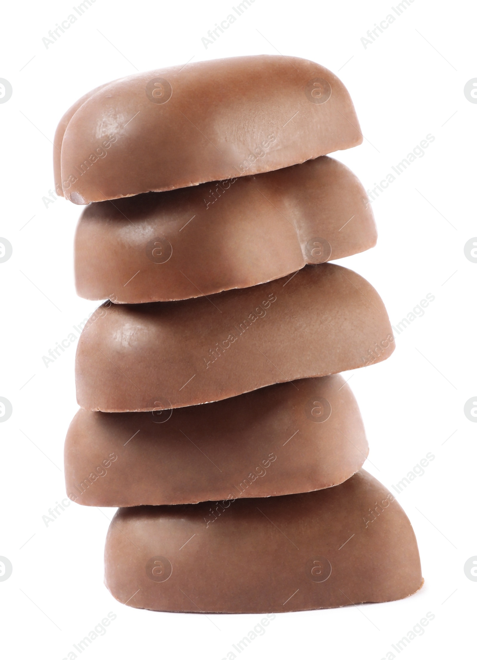 Photo of Beautiful heart shaped chocolate candies stacked on white background