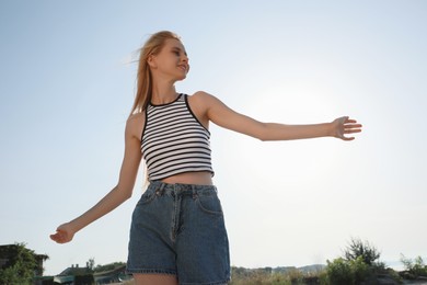Photo of Beautiful young woman outdoors on sunny day