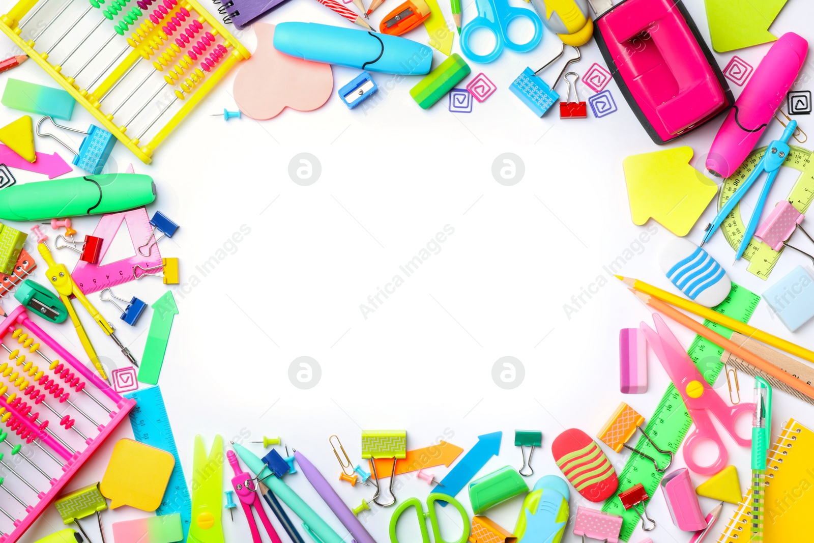 Photo of Frame made of different school stationery on white background