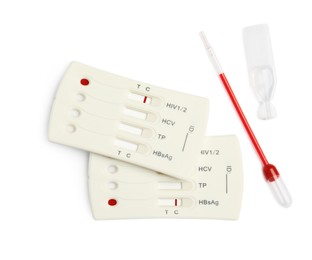 Photo of Disposable express hepatitis test kit on white background, flat lay. Space for text