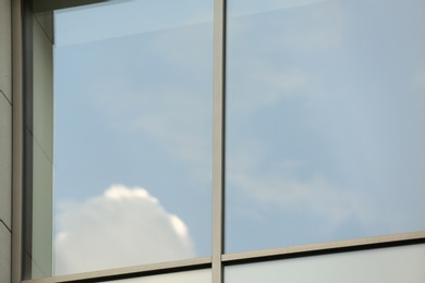 Photo of Closeup view of tinted window. Urban architecture