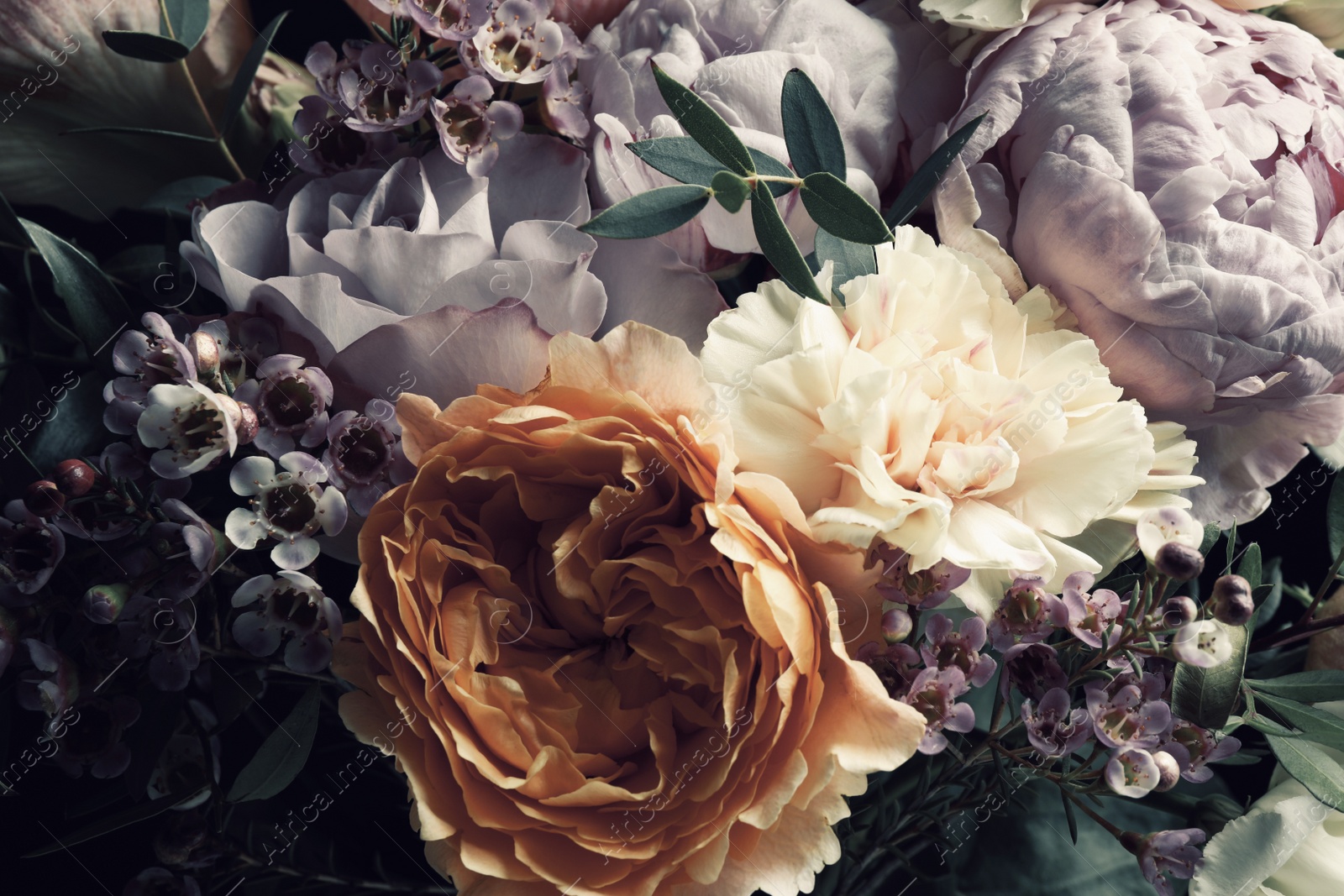 Photo of Beautiful bouquet of different flowers, closeup. Floral card design with dark vintage effect
