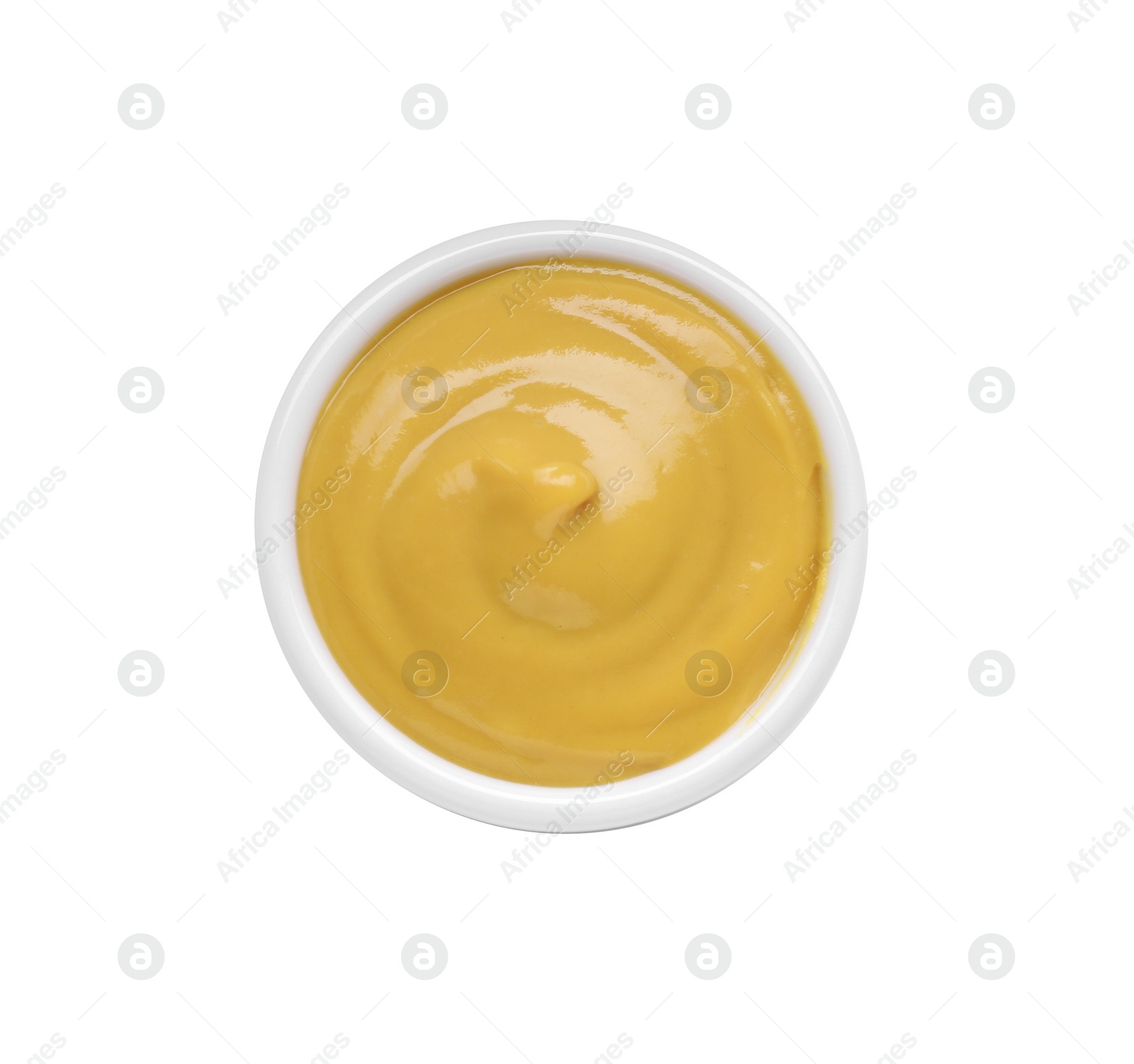 Photo of Bowl with delicious mustard on white background, top view