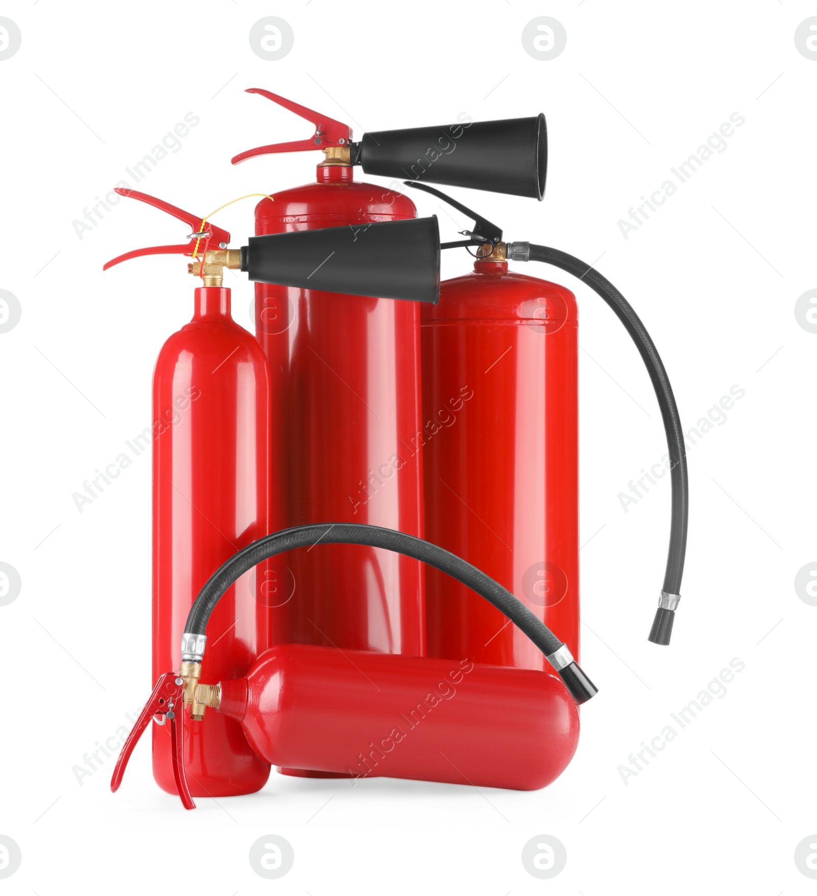 Photo of Many red fire extinguishers on white background