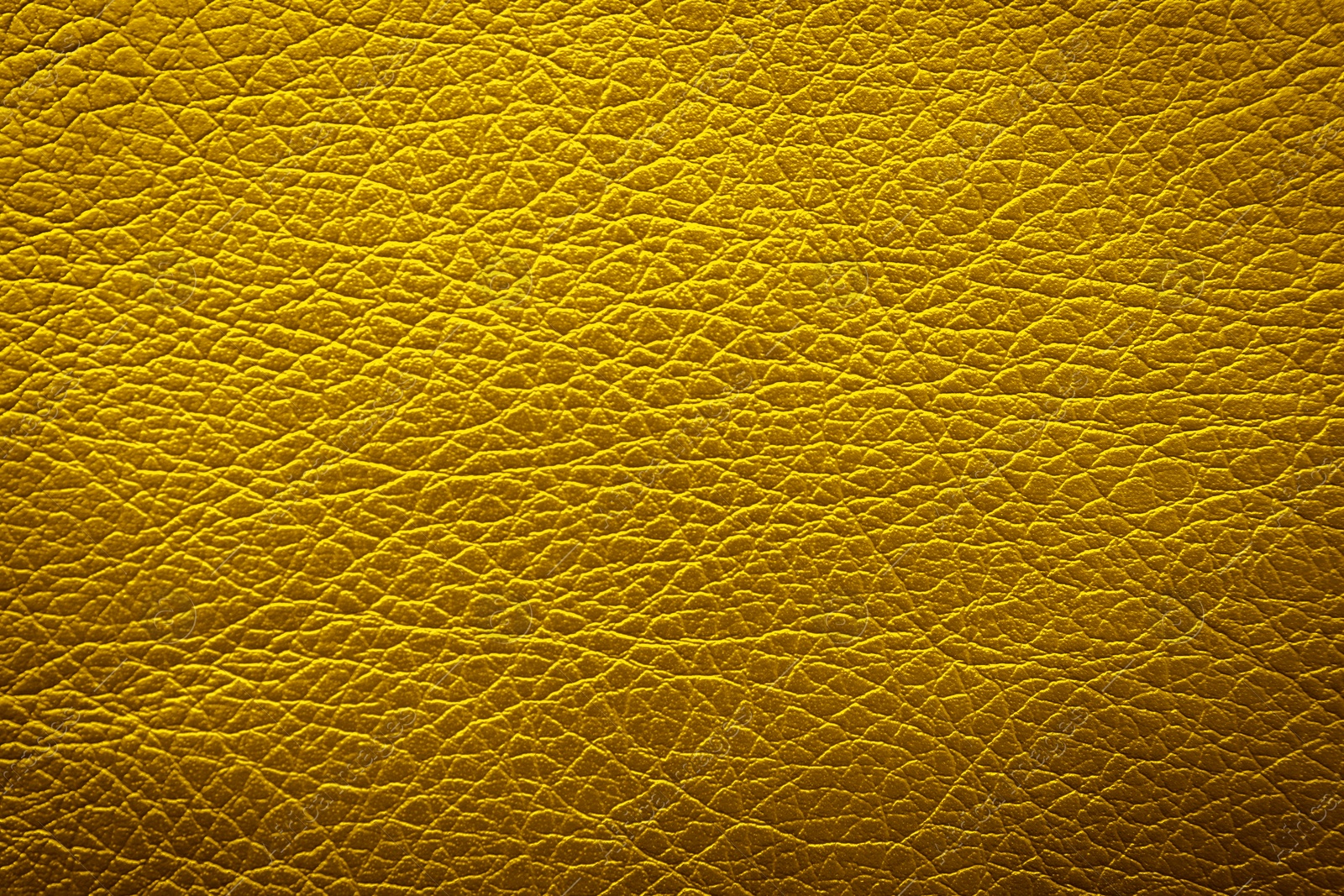 Image of Golden textured surface as background, closeup view