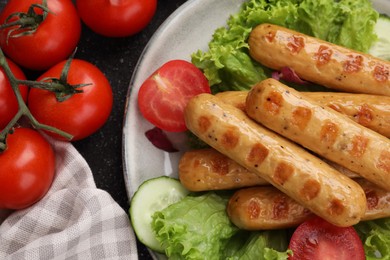 Photo of Delicious grilled vegan sausages with fresh herbs and vegetables on table, flat lay