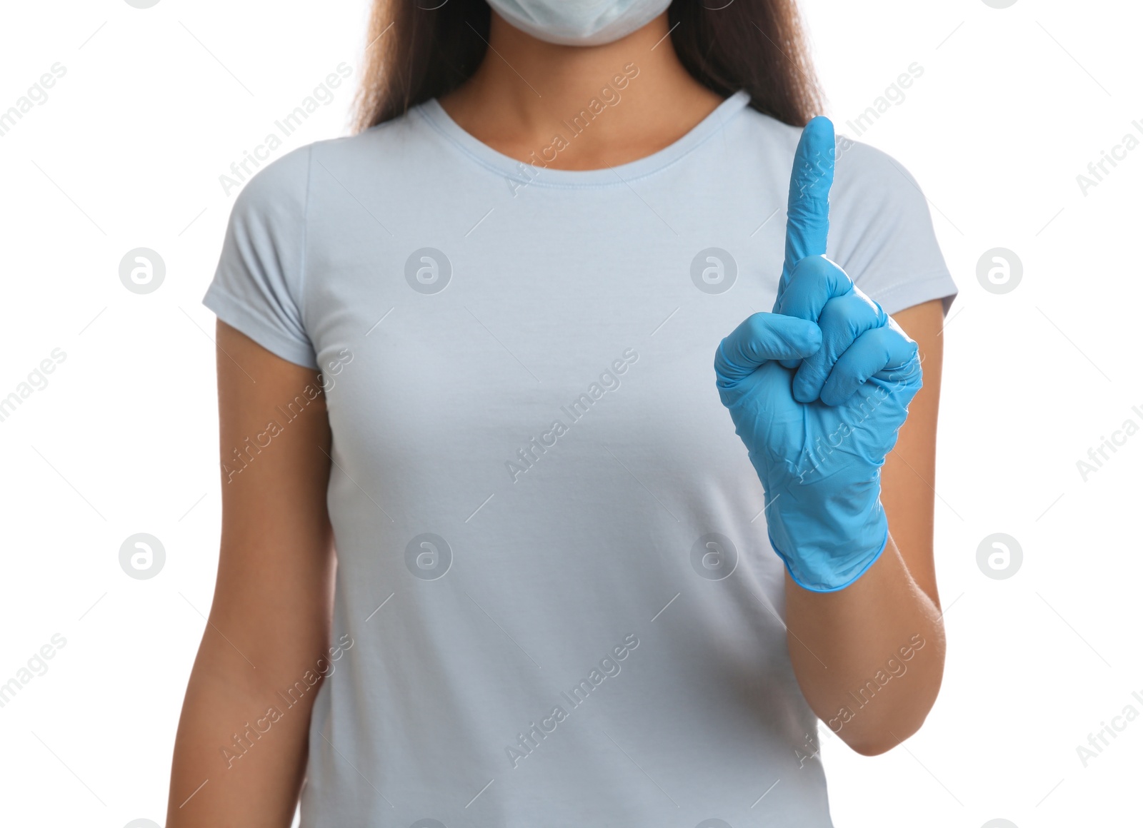 Photo of Woman in medical gloves with raised index finger on white background, closeup