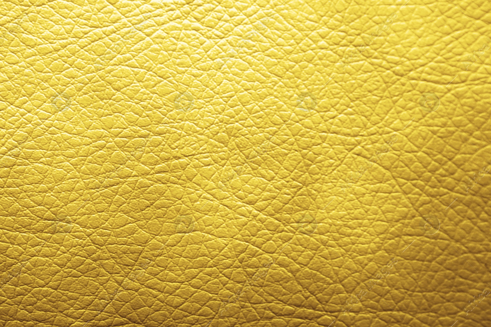 Image of Golden textured surface as background, closeup view