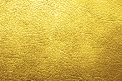 Image of Golden textured surface as background, closeup view