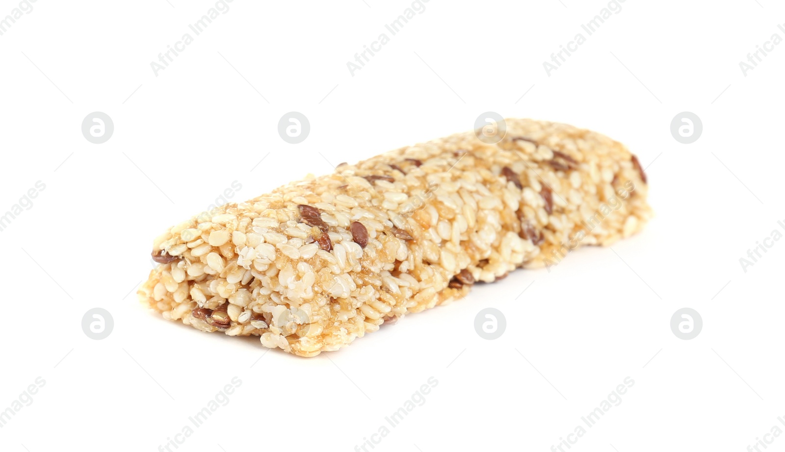 Photo of Tasty sesame seed bar isolated on white