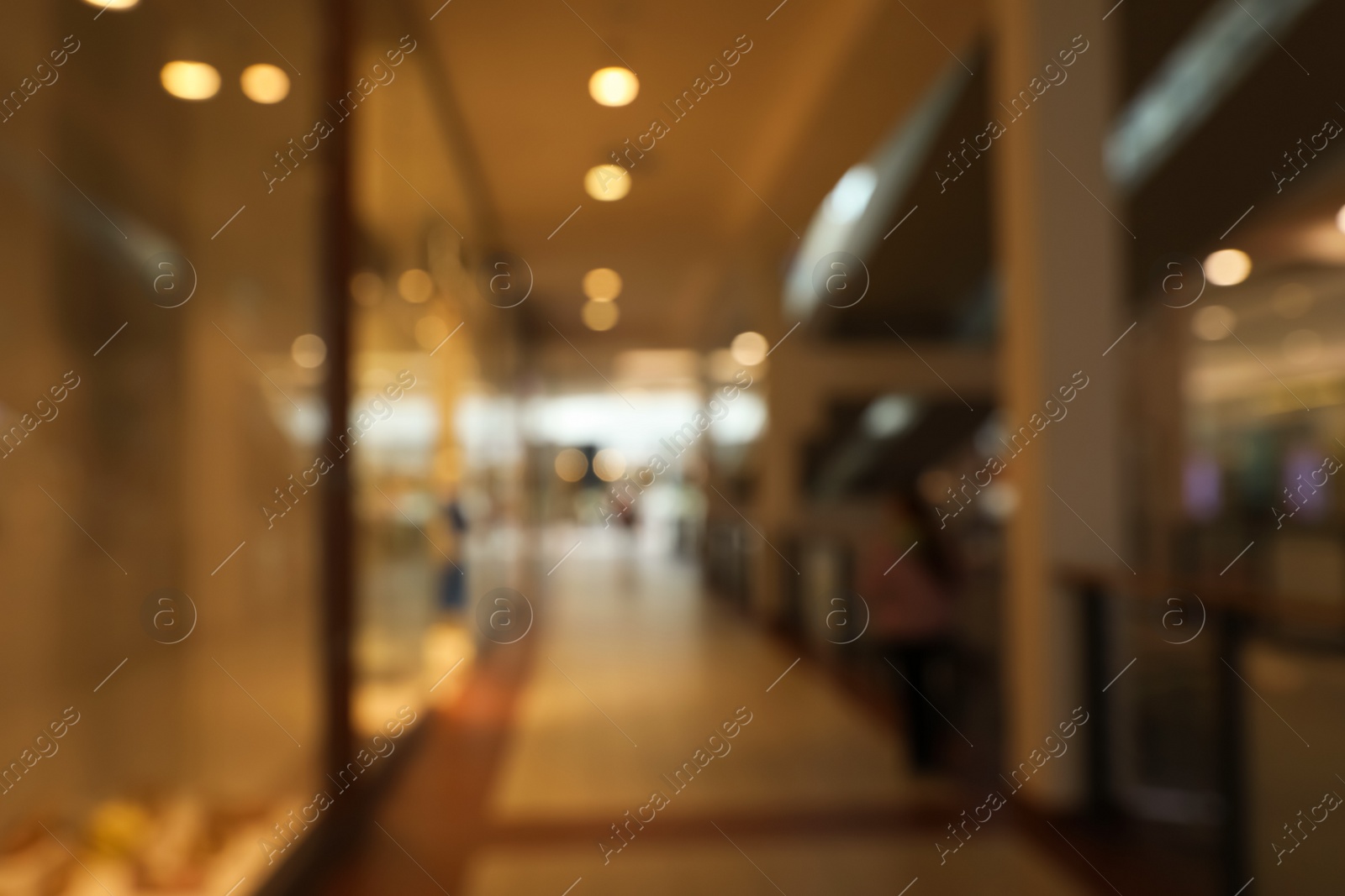 Photo of Blurred view of shopping mall interior. Bokeh effect