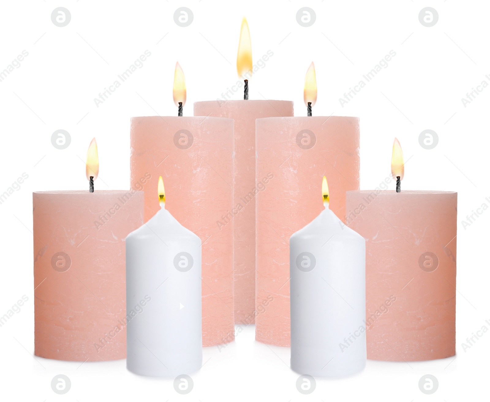 Image of Set of burning color candles on white background