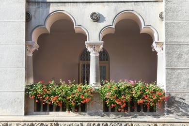 Photo of View of balcony with decorative elements and flowers