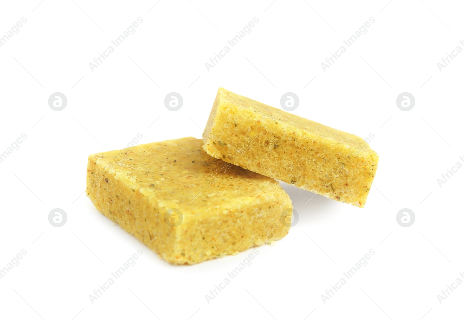 Photo of Bouillon cubes on white background. Broth concentrate