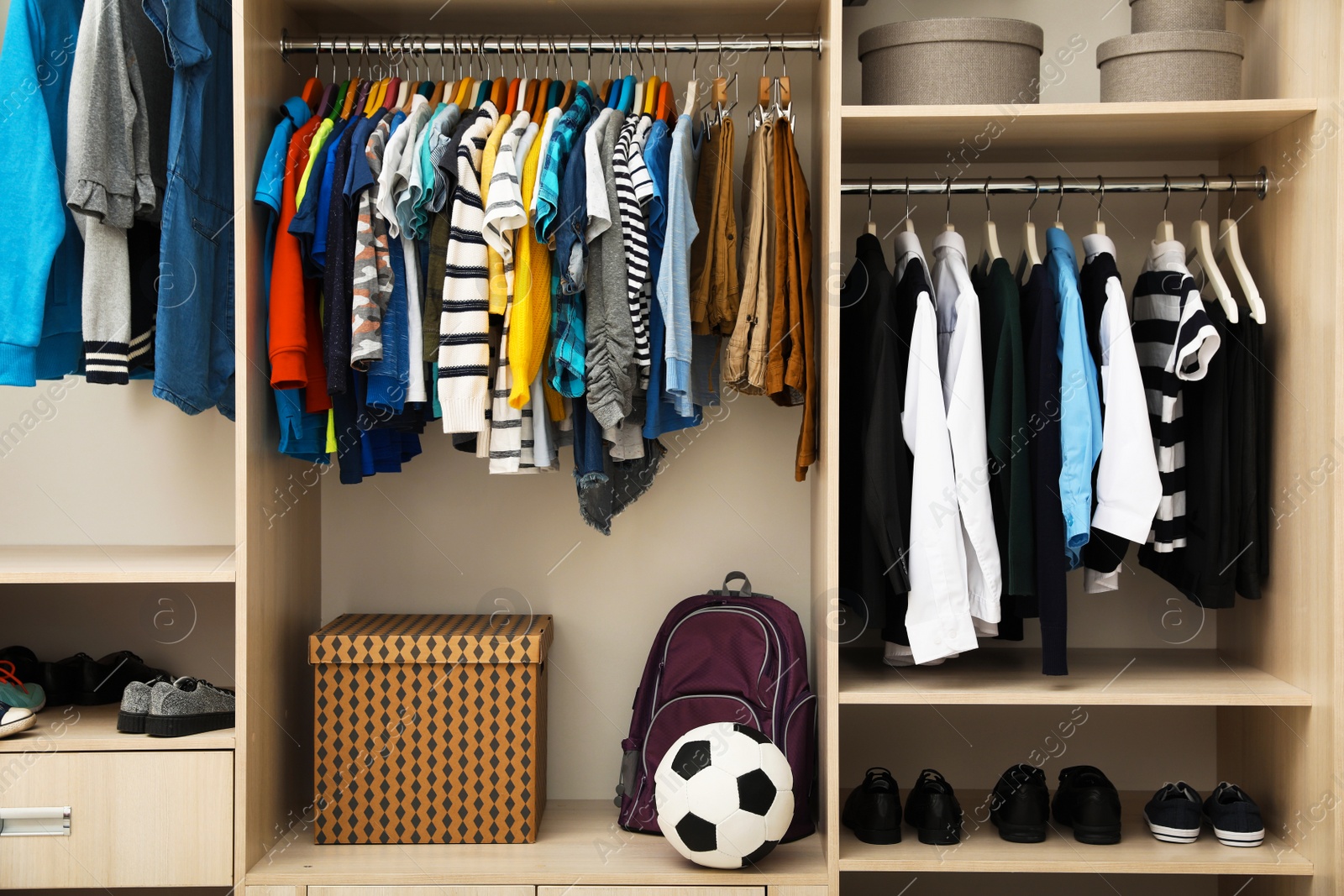 Photo of Large wardrobe with teenager clothes, shoes and accessories